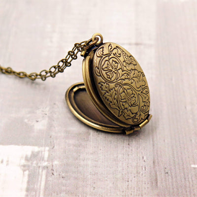 Antiqued Bronze Four Photo Family Locket