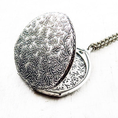 Vintage Silver Geometric Locket with Floral Motif